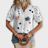 Bruna - Blusa elegante com um decote pontiagudo