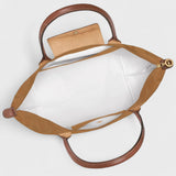 Delfina - Mala Versátil